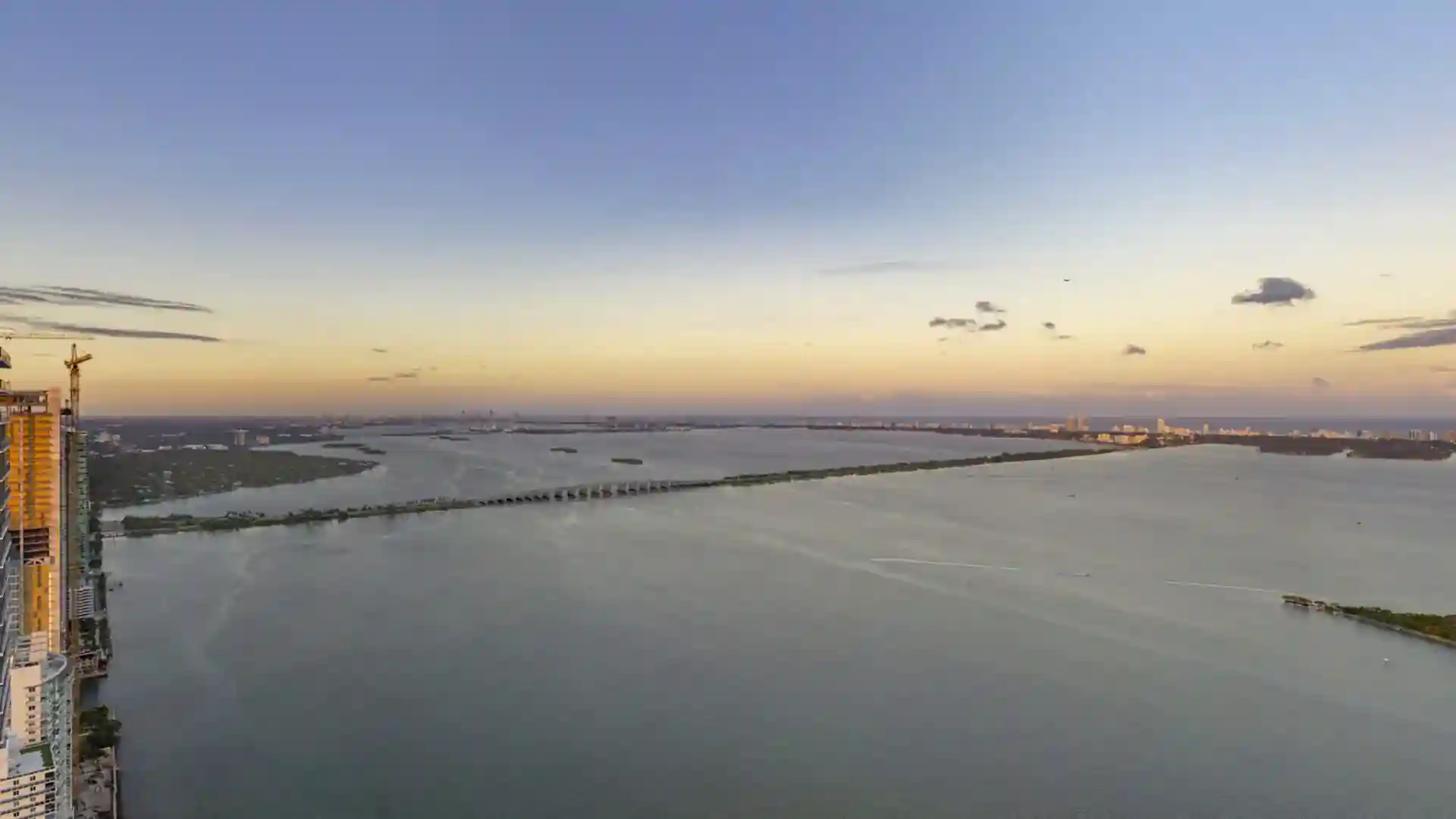Amazing aerial view of the bridge connecting two islands with awesome weather