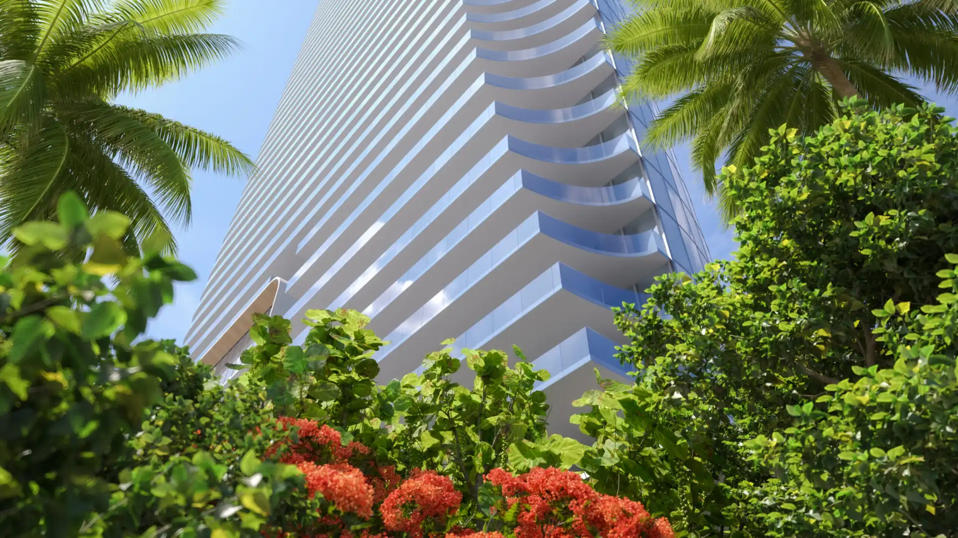 A photo captured through garden flowers, showcasing beautifully designed architectural skyscrapers in miami.